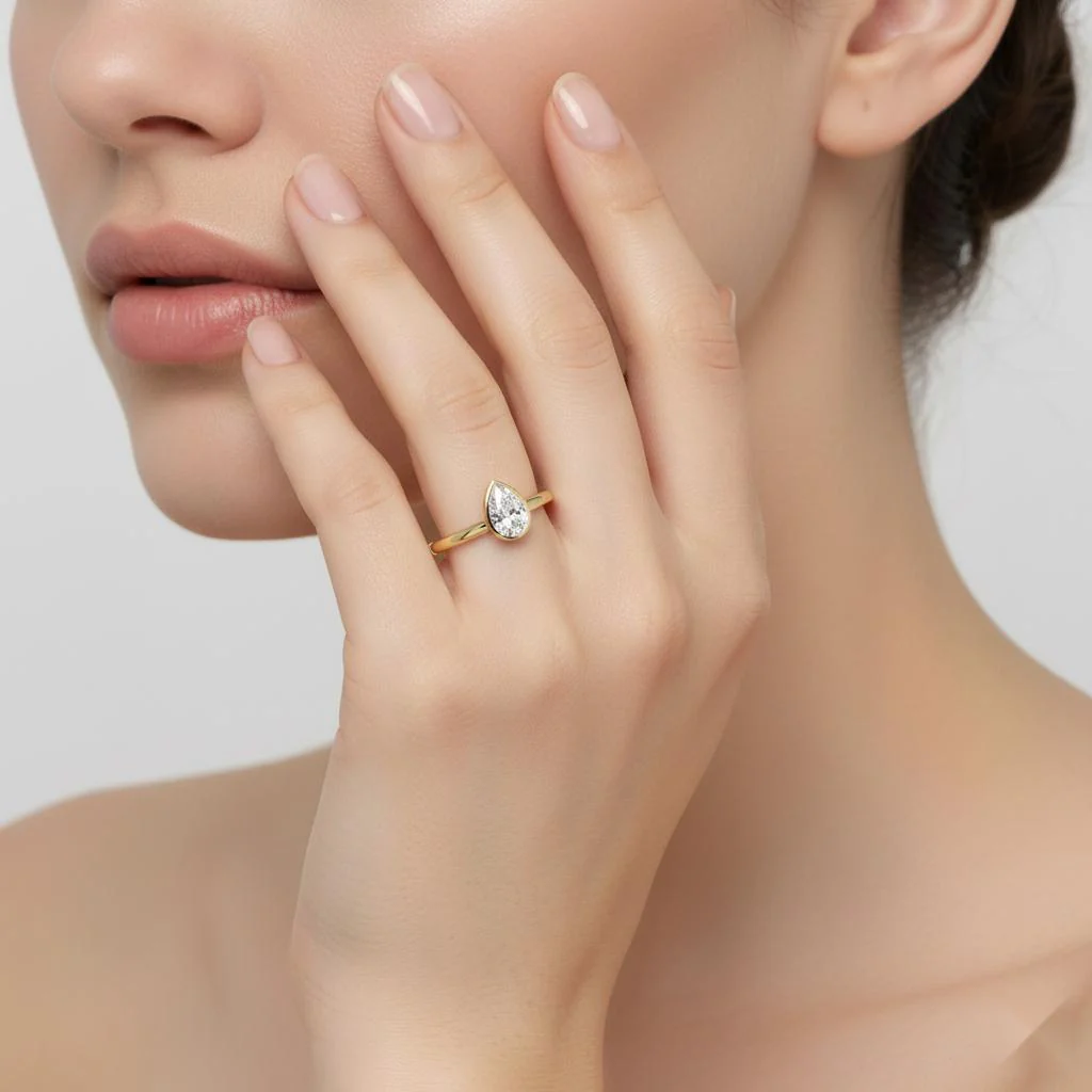 Pear Solitaire With Bezel Set Engagement Ring - Image 4